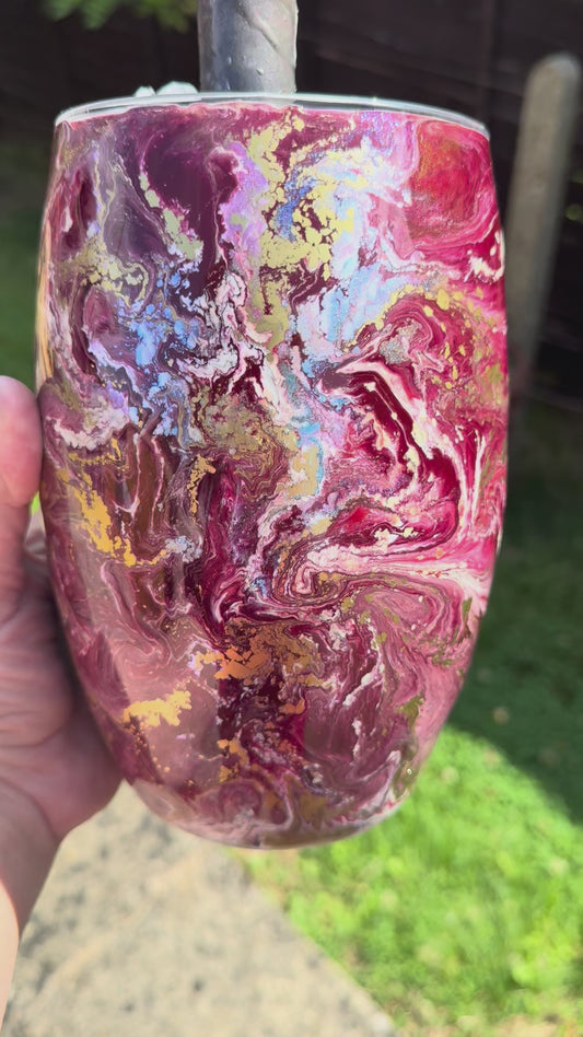 Large rugby shaped vase .  Flowers were added using AI .